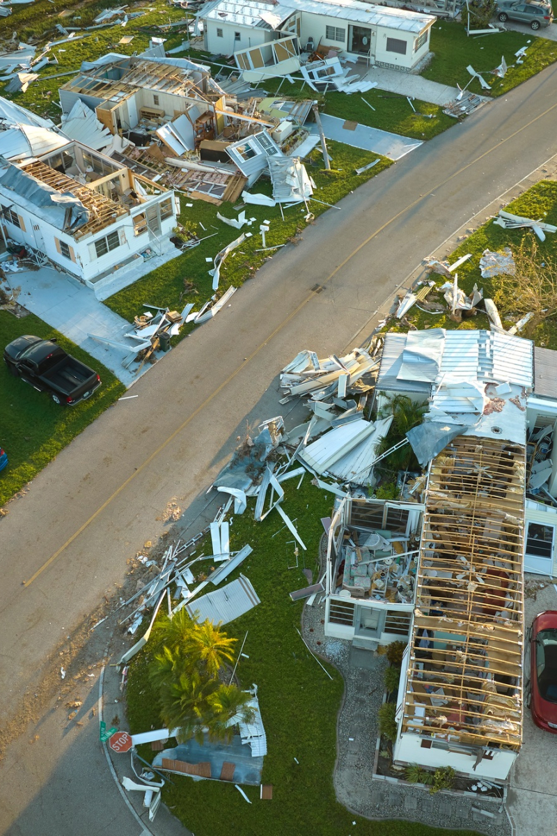 Severely damaged by hurricane Ian houses in Florida mobile home residential area.